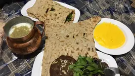 کتیبه کاشی‌کاری‌شده در ورودی سفره‌خانه ملک‌سلطان جارچی‌باشی